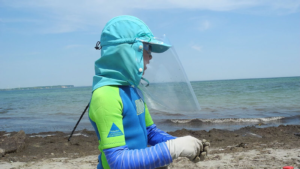 XP Patient mit Schutzausrüstung am Strand