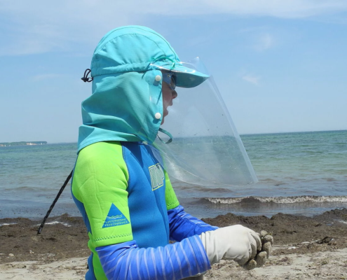 XP Patient mit Schutzausrüstung am Strand